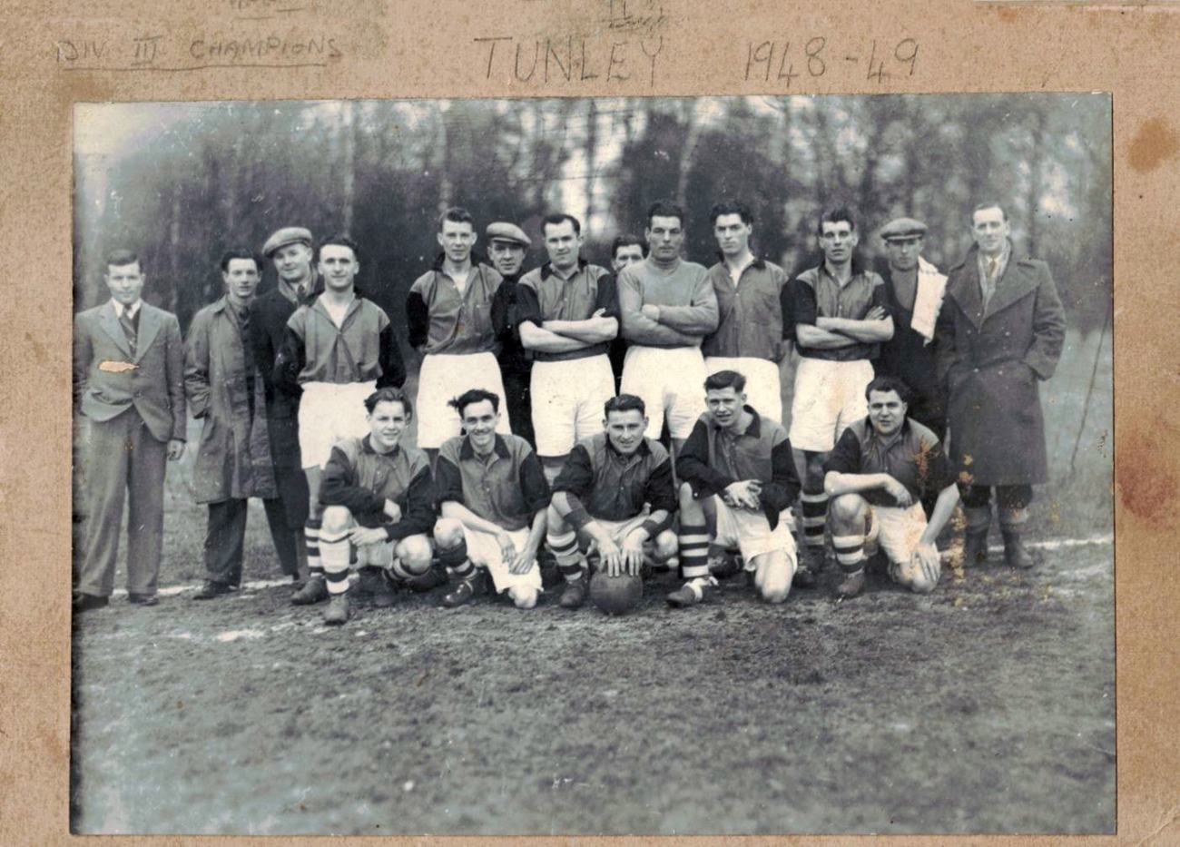 Team photo in dark shirts and white shorts, mounted on card marked Div III Champions Tunley 1948-49