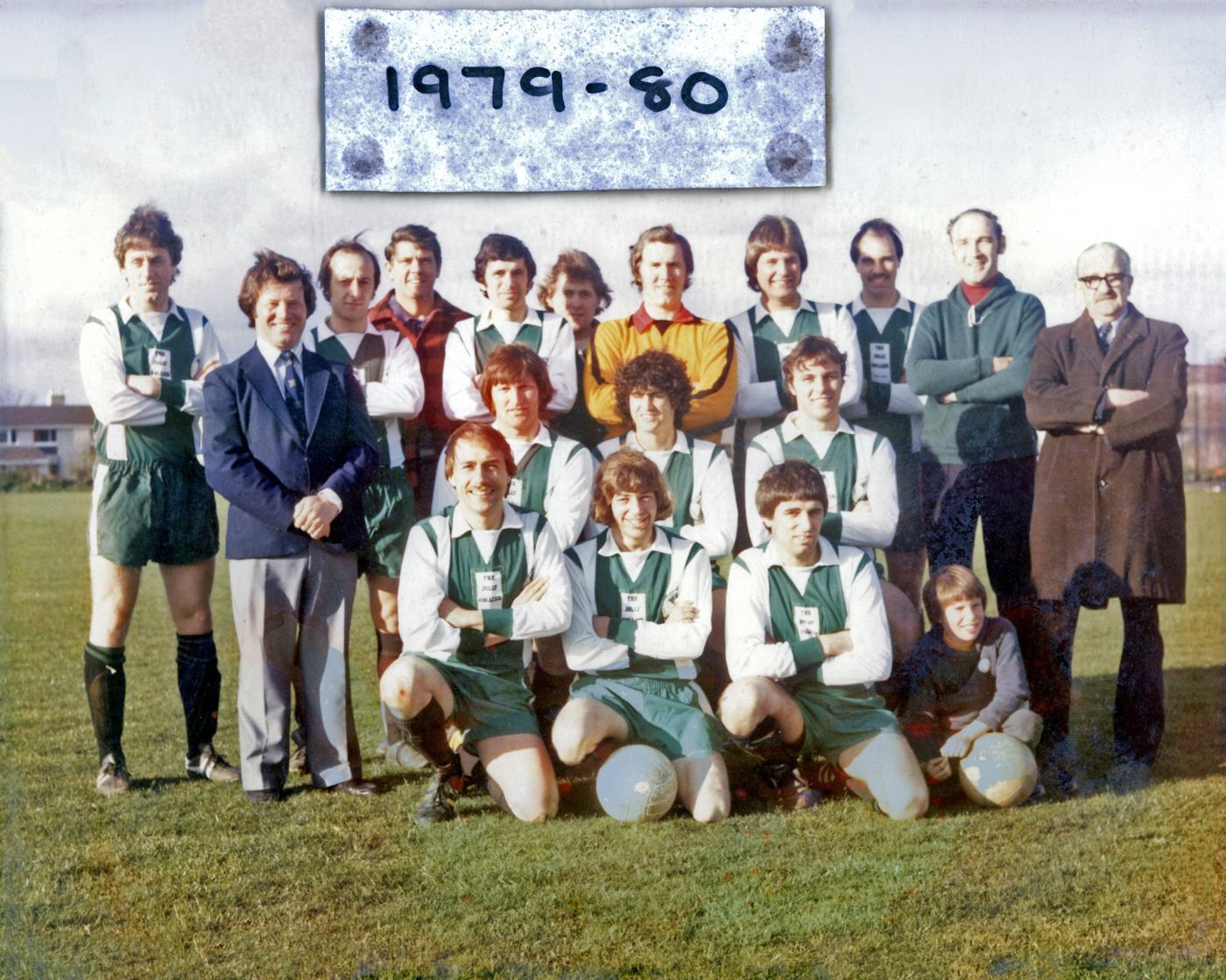 Colour photo of the 1979-80 squad in green and white kit with officials